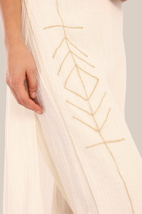 Pants with an embroidered asymmetric skirt