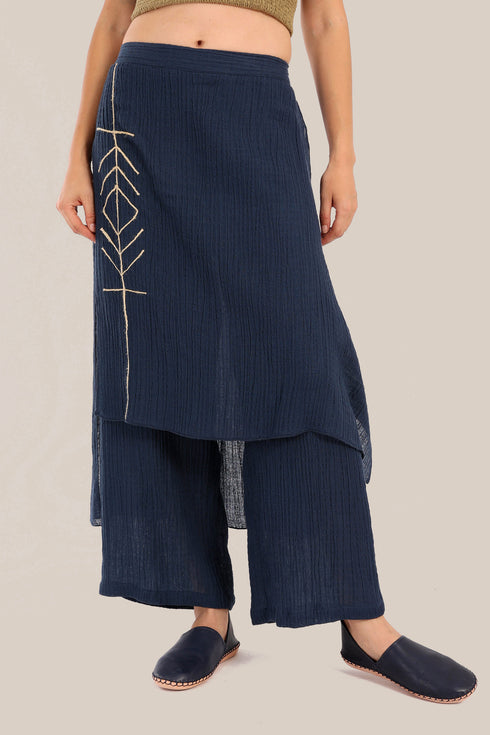 Pants with an embroidered asymmetric skirt