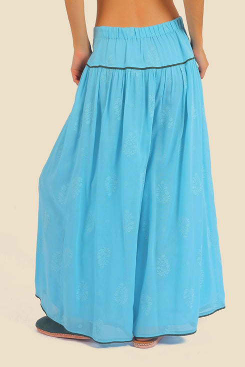 Super wide leg printed pants with contrast color piping