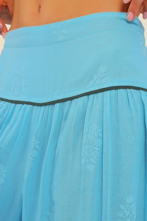 Super wide leg printed pants with contrast color piping