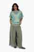 Super wide leg printed pants with contrast color piping