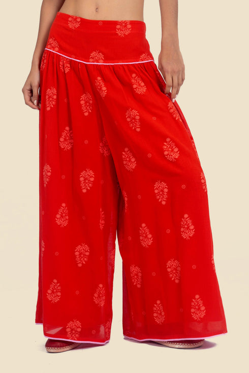 Super wide leg printed pants with contrast color piping
