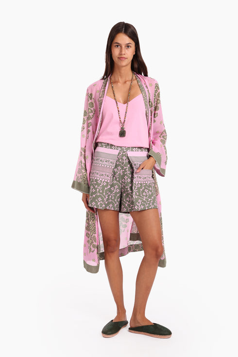 Shorts in printed cotton with front flaps