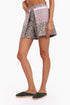 Shorts in printed cotton with front flaps