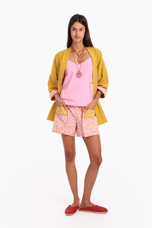 Shorts in printed cotton with front flaps