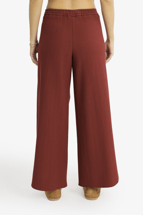 Hand embroidered wide-leg pants with rounded hems
