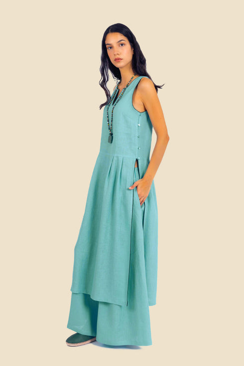 Sleeveless tunic dress in linen with contrasting color trims