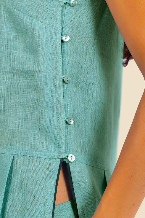 Sleeveless tunic dress in linen with contrasting color trims