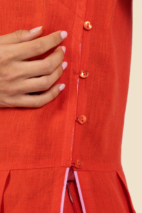 Sleeveless tunic dress in linen with contrasting color trims