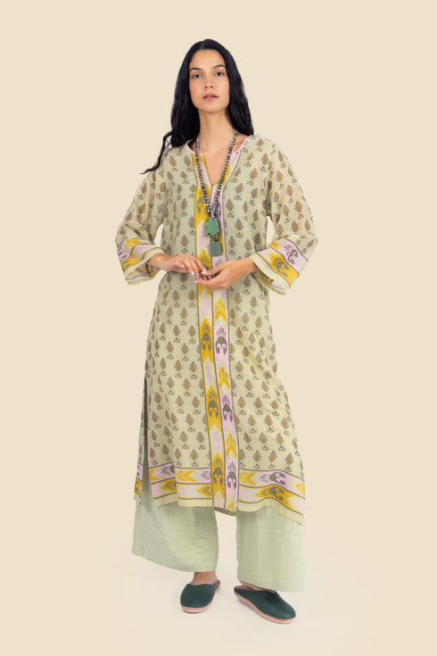 Tunic dress in printed cotton gauze with side slits