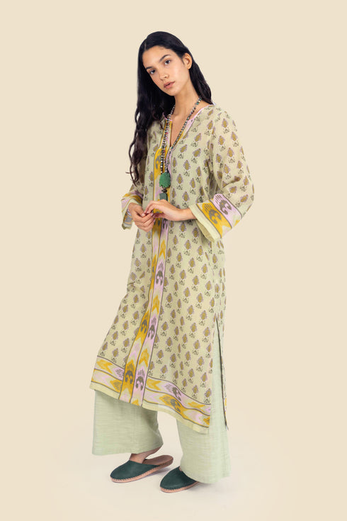 Tunic dress in printed cotton gauze with side slits