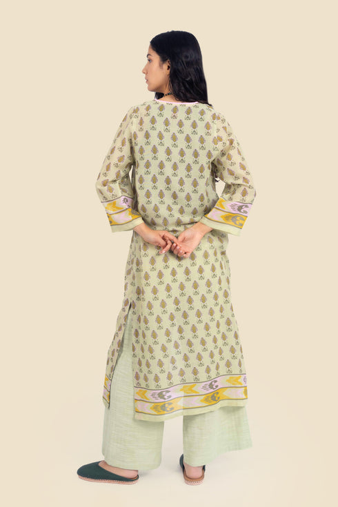 Tunic dress in printed cotton gauze with side slits