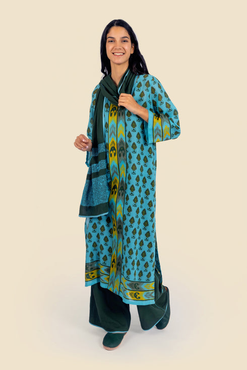 Tunic dress in printed cotton gauze with side slits