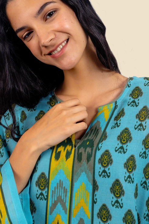 Tunic dress in printed cotton gauze with side slits
