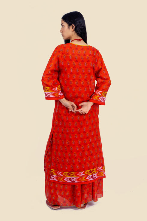 Tunic dress in printed cotton gauze with side slits