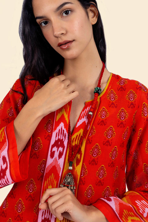 Tunic dress in printed cotton gauze with side slits