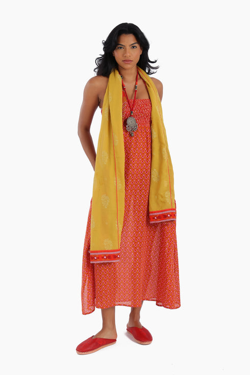 Dress in printed cotton gauze with halter neck tie