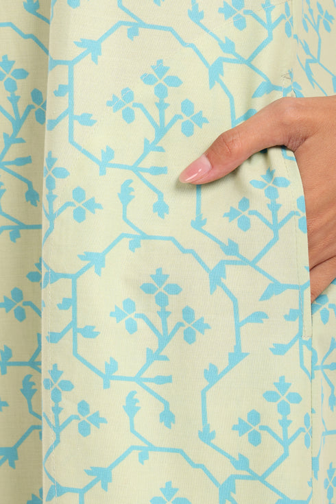 Long Sleeveless printed dress with thin adjustable straps and pockets