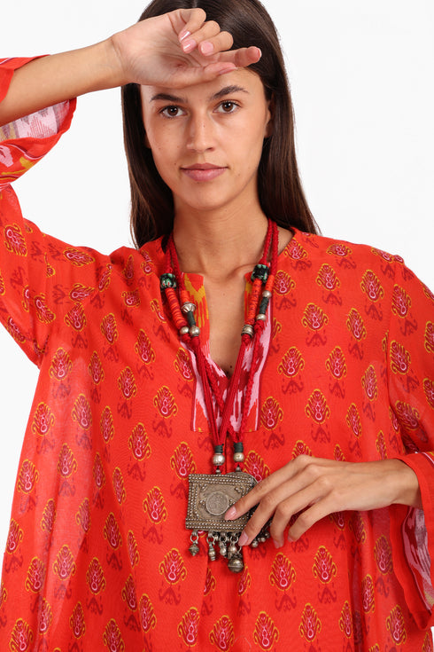 Long dress in printed cotton gauze with side pockets