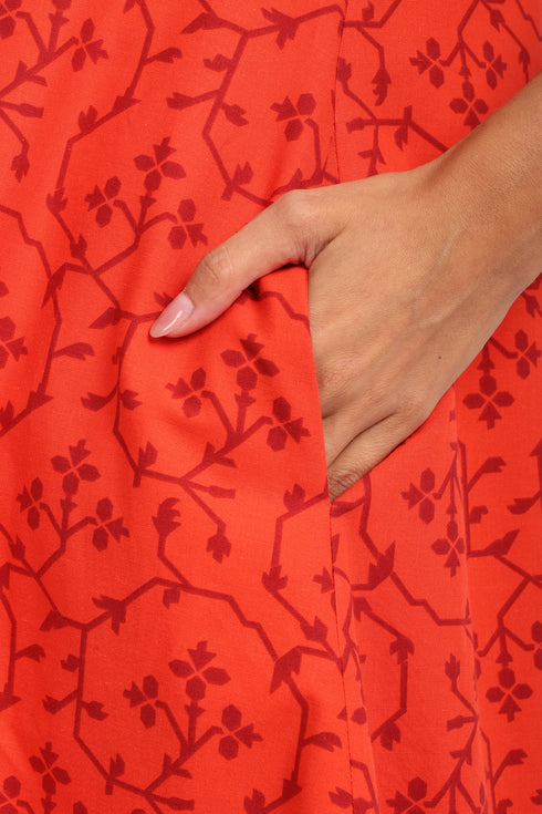 Sleeveless dress in printed cotton with pockets