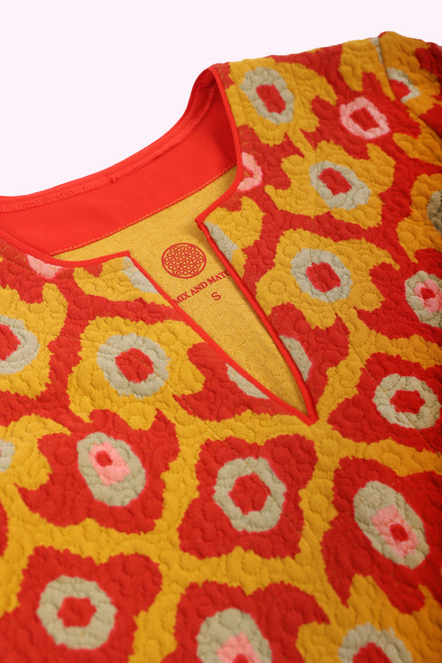 Short dress in printed quilted cotton blend with round neckline