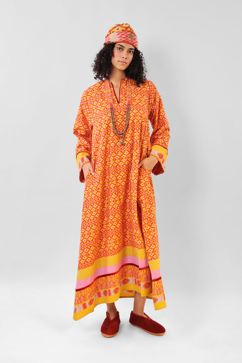 Long dress in printed cotton with pockets