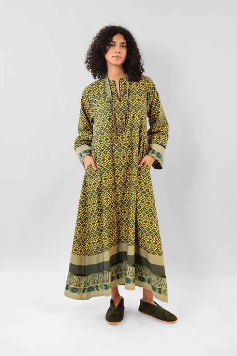 Long dress in printed cotton with pockets