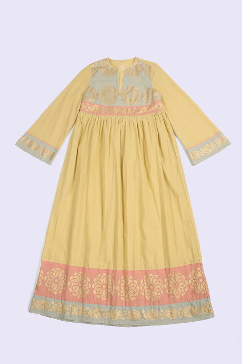 Cotton voile ruffle dress with golden print