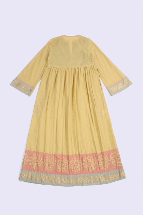 Cotton voile ruffle dress with golden print