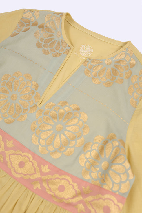 Cotton voile ruffle dress with golden print