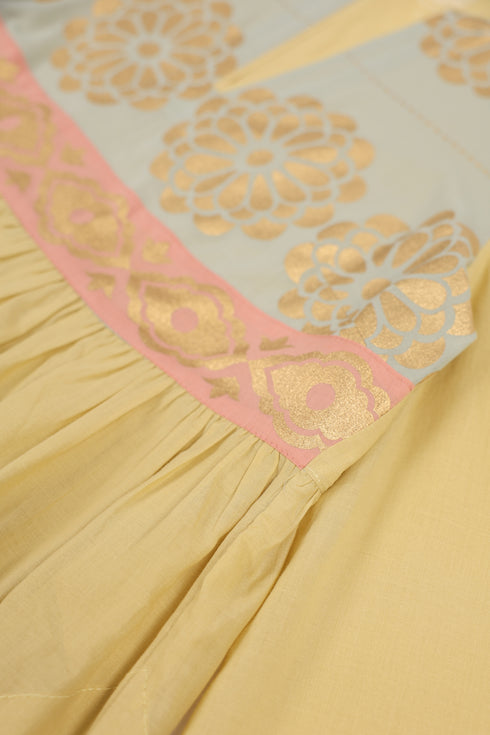 Cotton voile ruffle dress with golden print