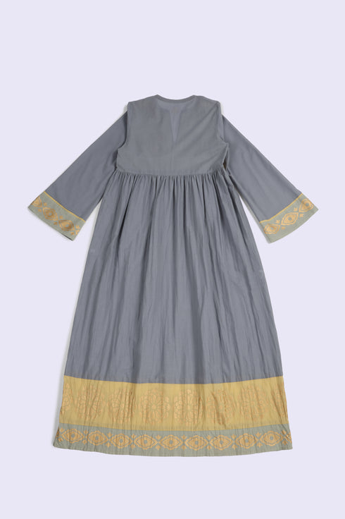 Cotton voile ruffle dress with golden print