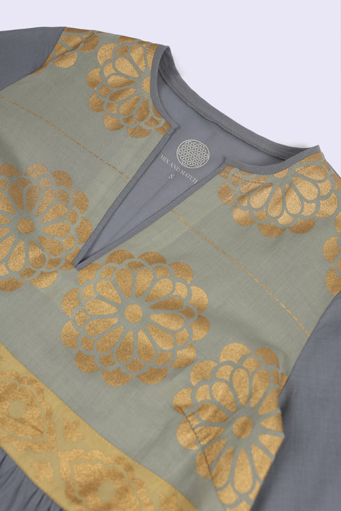 Cotton voile ruffle dress with golden print