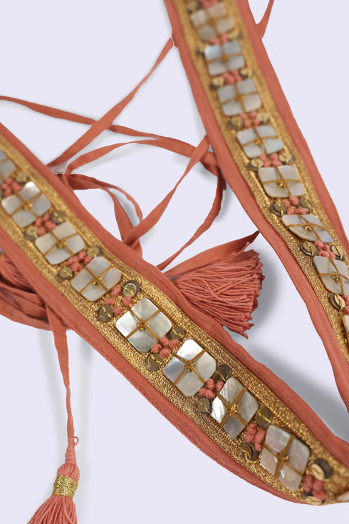 Pearl embellished tassel belt
