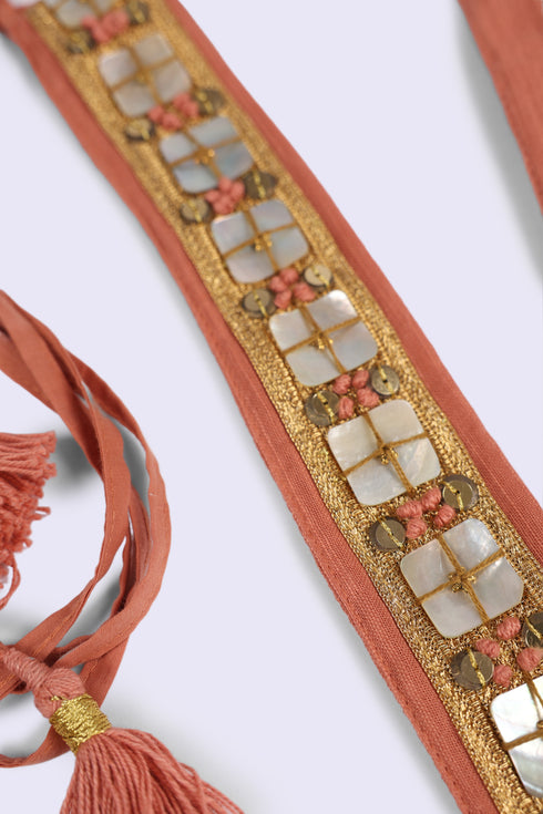 Pearl embellished tassel belt
