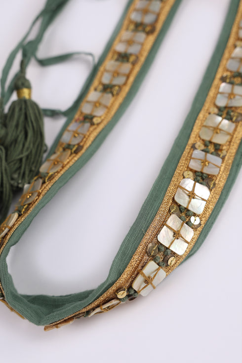 Pearl embellished tassel belt