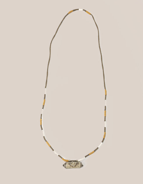long necklace with antique pendant