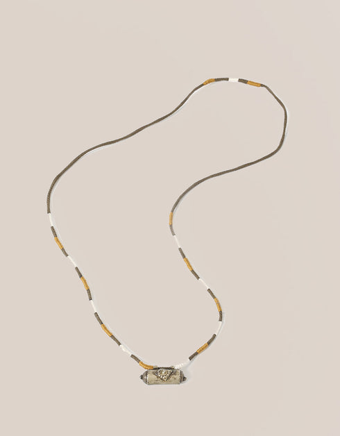long necklace with antique pendant