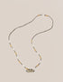 long necklace with antique pendant