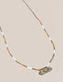 long necklace with antique pendant