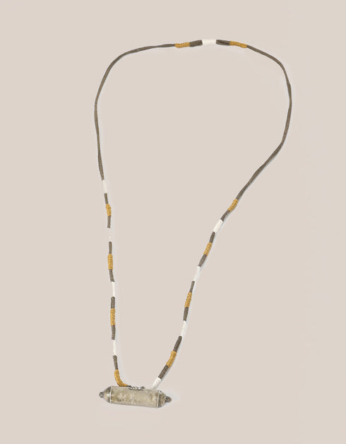 long necklace with antique pendant