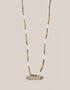 long necklace with antique pendant