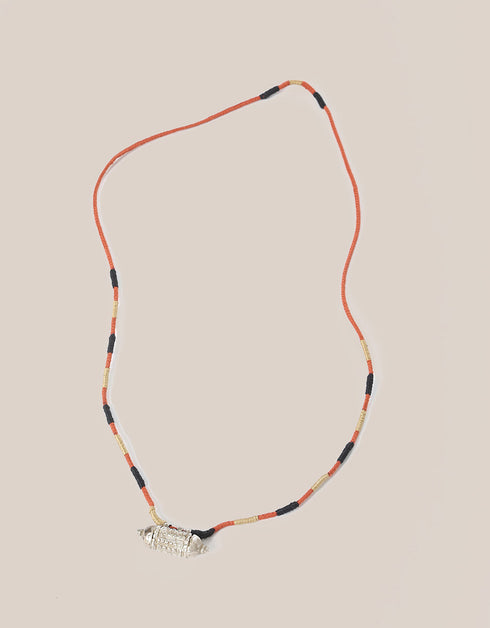 long necklace with antique pendant