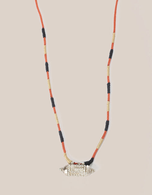 long necklace with antique pendant