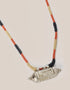 long necklace with antique pendant