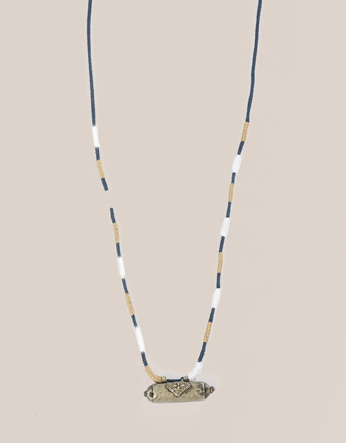 long necklace with antique pendant