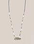long necklace with antique pendant