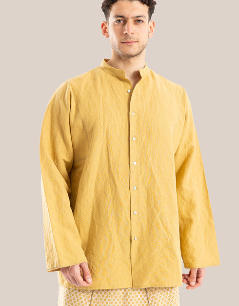 Shirt with decorative stitches and a high round collar