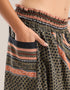 Harem pants with a wide elastic waistband