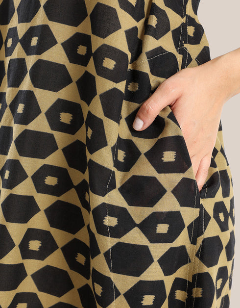 Sleeveless long dress with asymmetric hemline